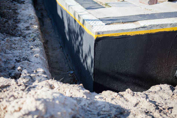 Professional Emergency Waterproofing technician working in Hughesville, MD